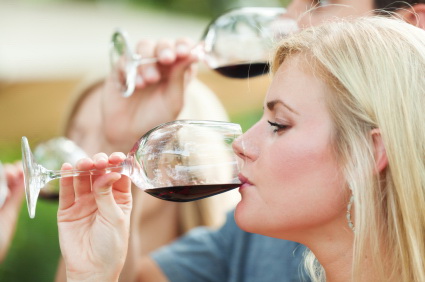 tasting wine blond woman