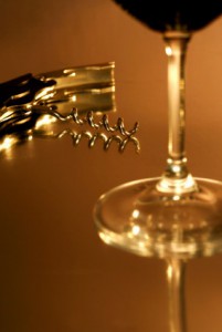 corkscrew and wine glass