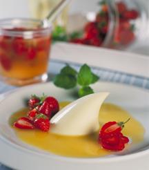 Pannacotta with Canadian Brie and yogurt, strawberry soup with passion fruit juice